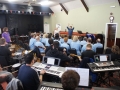 James conducting Castaway Sing and Band